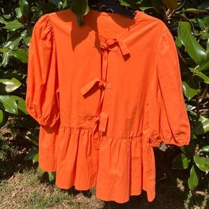 NEW Orange peplum top